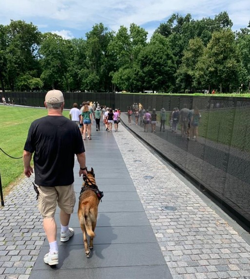 Marshall accompanying Jeff Daley at the Vietnam Veterans Memorial
